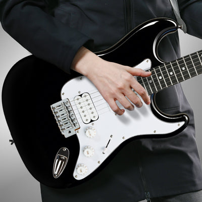 Musician playing GOLDRIFF 39-inch black stratocaster-style electric guitar, showing HSS pickups and white pickguard#color_black