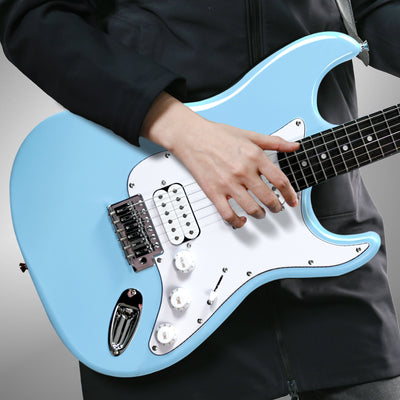 Musician playing GOLDRIFF 39-inch blue stratocaster-style electric guitar, showing HSS pickups and white pickguard#color_powder-blue
